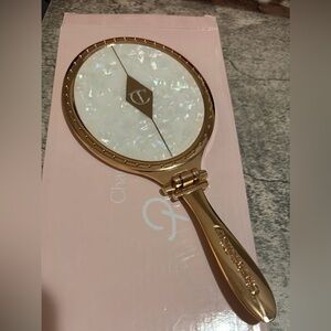 Charlotte Tilbury Pearl and Gold Mirror